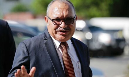 PNG: Former Prime Minister issued arrest warrant.